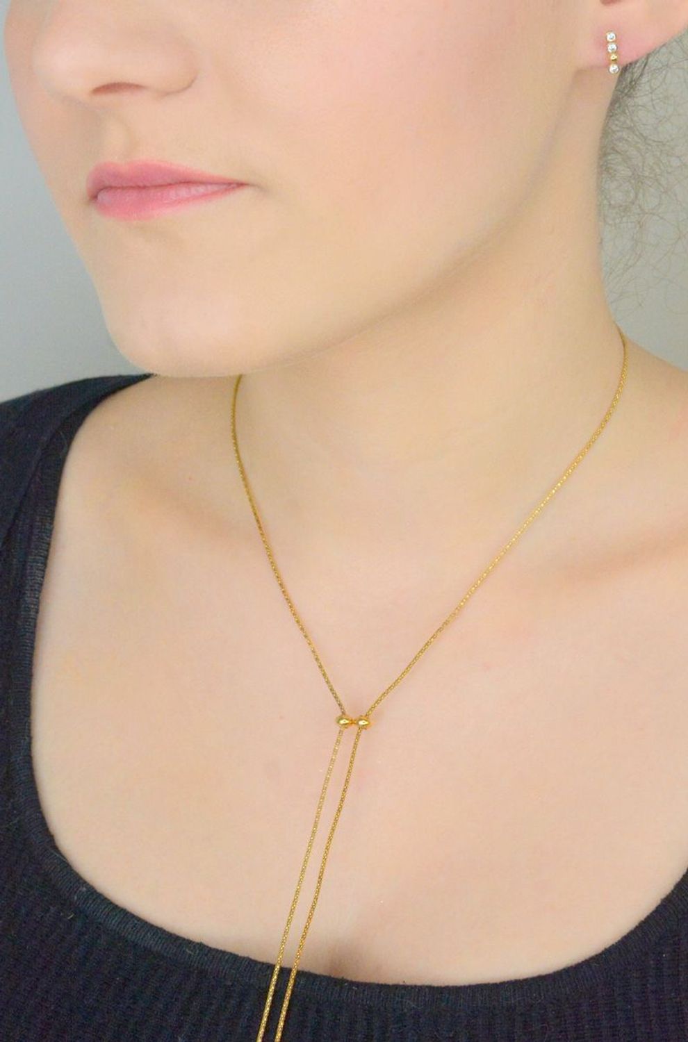 Kolczyki złote patyczki z cyrkonią pr 585, KL 9869 585  Kolczyki składają się z czterech małych kuleczek, ozdobione cyrkoniami. Kolczyki to ponadczasowa biżuteria, która pasuje do każdego 1.jpg